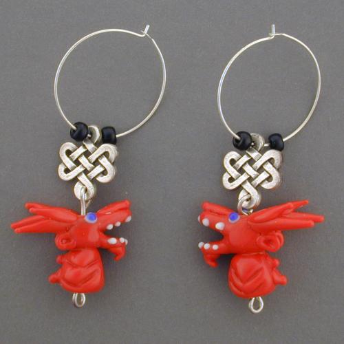 Enjoy these handmade dragon bead earrings with a Celtic Knot. Matching necklace available.