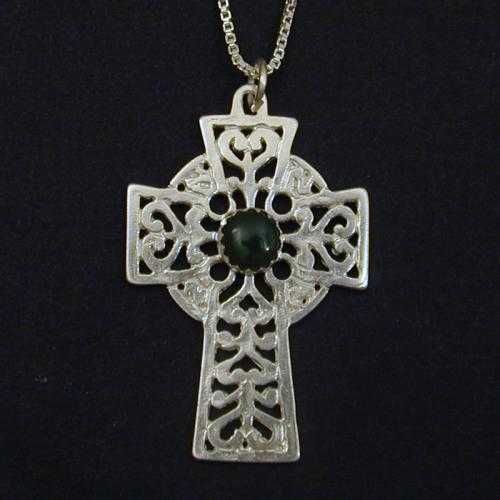 This lovely celtic cross holds a jade cabochon. This celtic cross is also available in other cabochon stones.