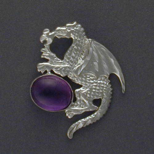 A dragon holds an oval Amethyst