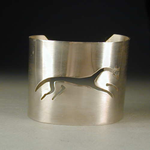 This sterling silver bracelet features a cutout of the Uffington Horse Chalk Figure in England.