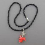 Enjoy this handmade dragon bead necklace with red or black Czech glass beads. Matching earrings available.