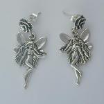 Sterling silver fairy with a rose stud decorate these post earrings