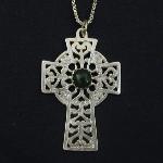 This lovely celtic cross holds a jade cabochon. This celtic cross is also available in other cabochon stones.