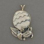 Enjoy this unique fossilized shell and turtle pendent. Imagine the rippling water in the patterns of the shell.