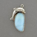 Imagine the quiet sunny day reflected in this lovely blue larimar pendent with a dolphin.